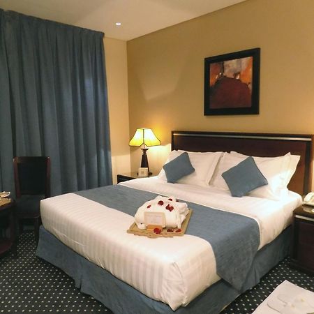 Onizah Hotel Unaizah Værelse billede