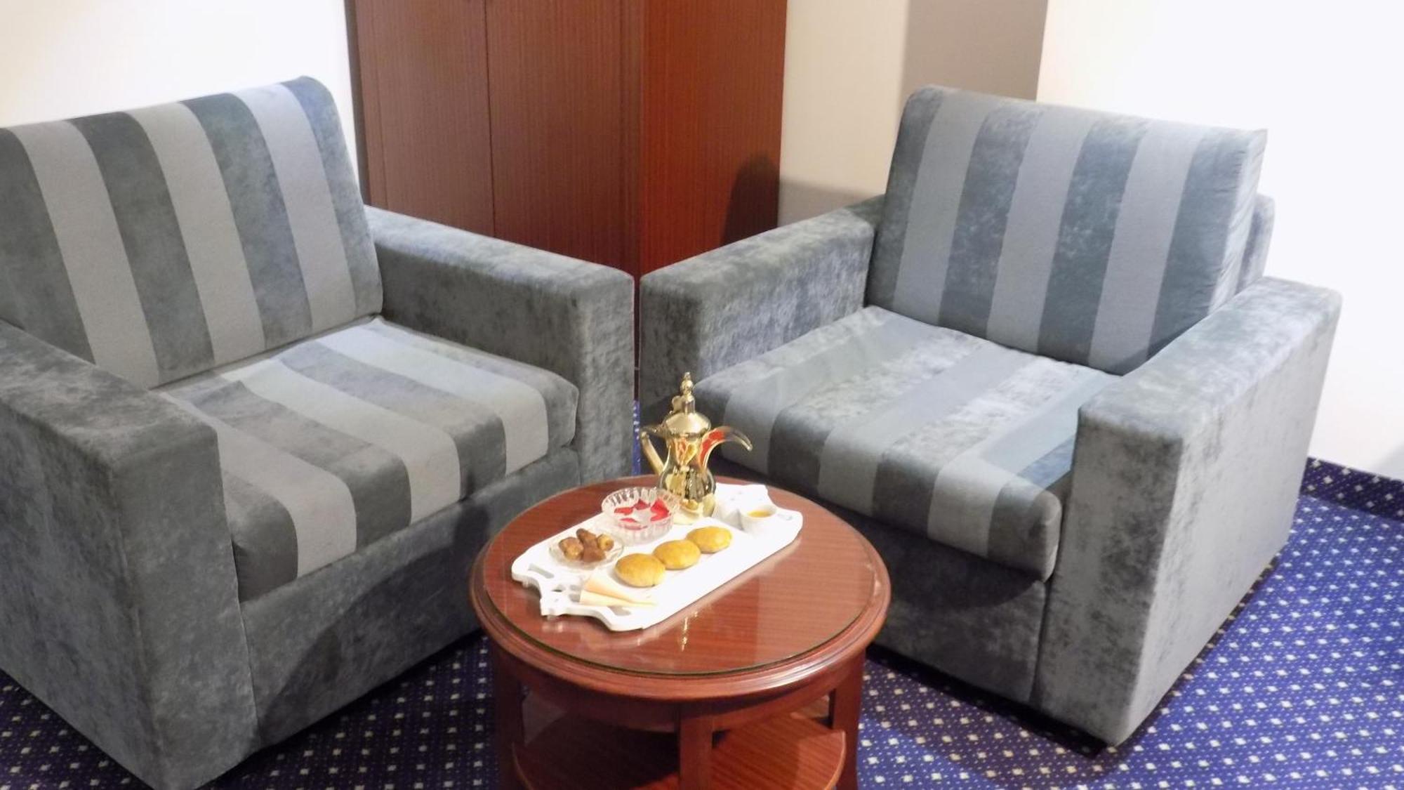 Onizah Hotel Unaizah Værelse billede